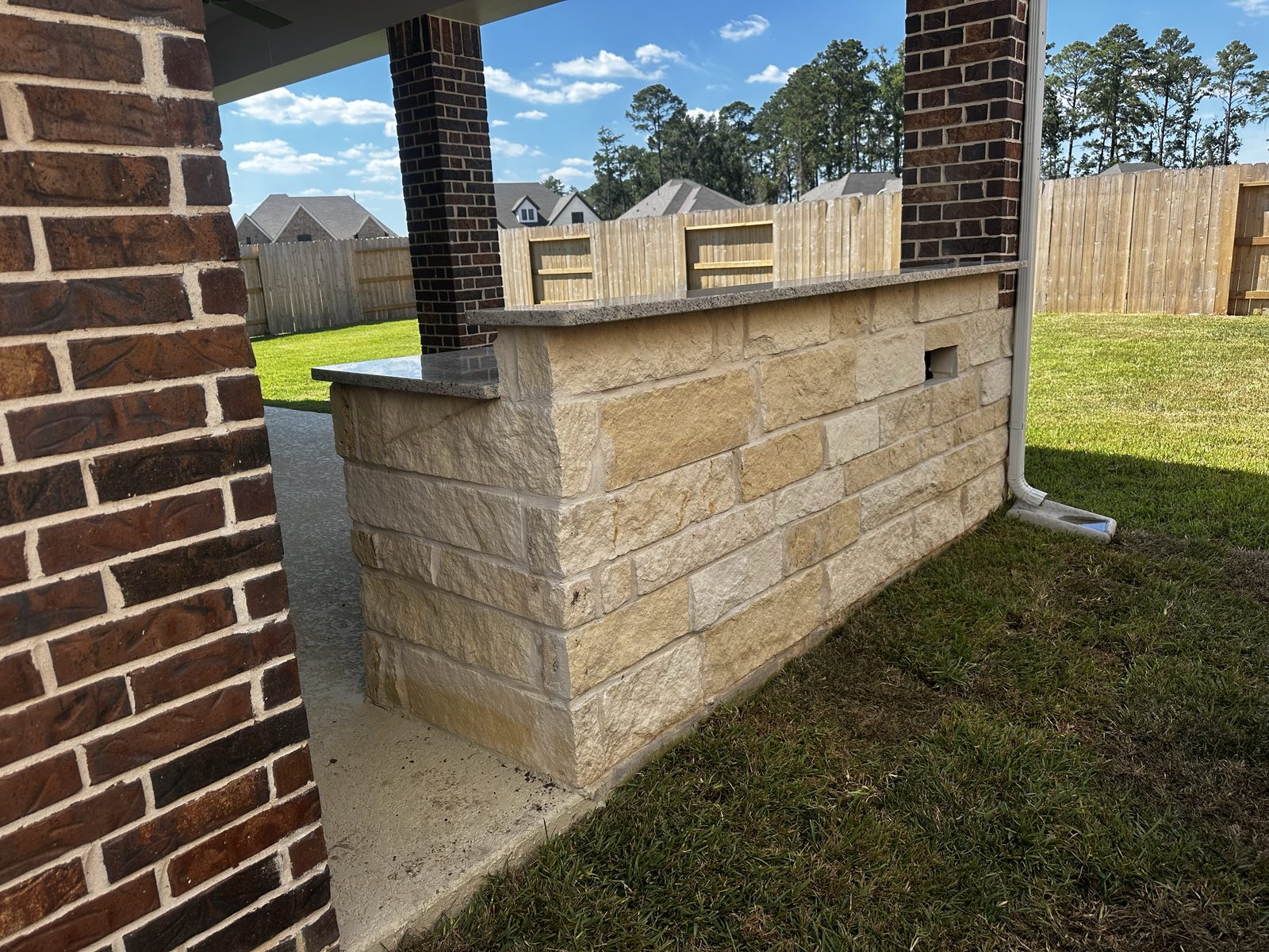 Custom stone bar and counter by Coronado Exteriors