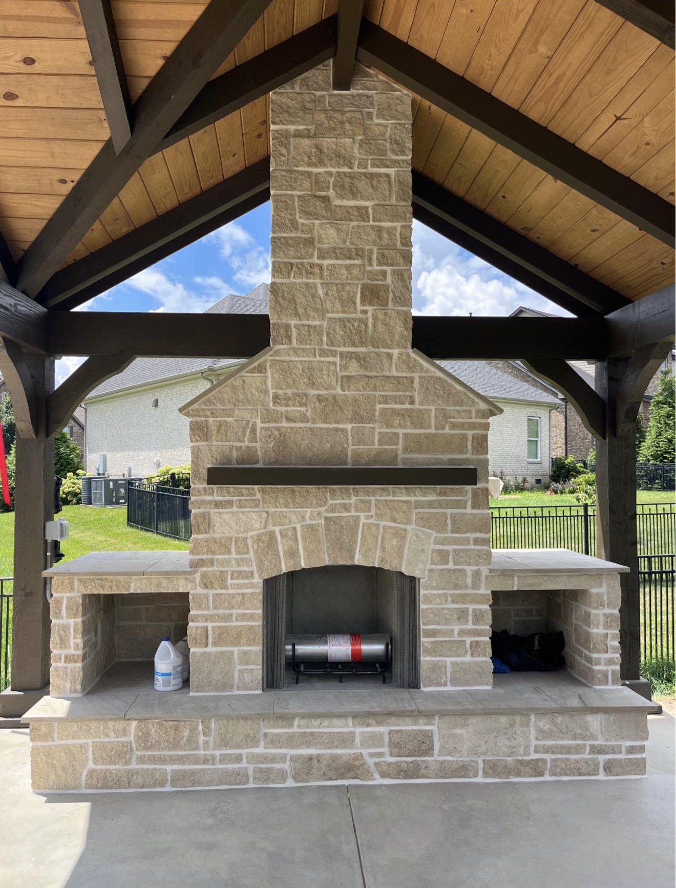 Custom stone fireplace built by Coronado Exteriors