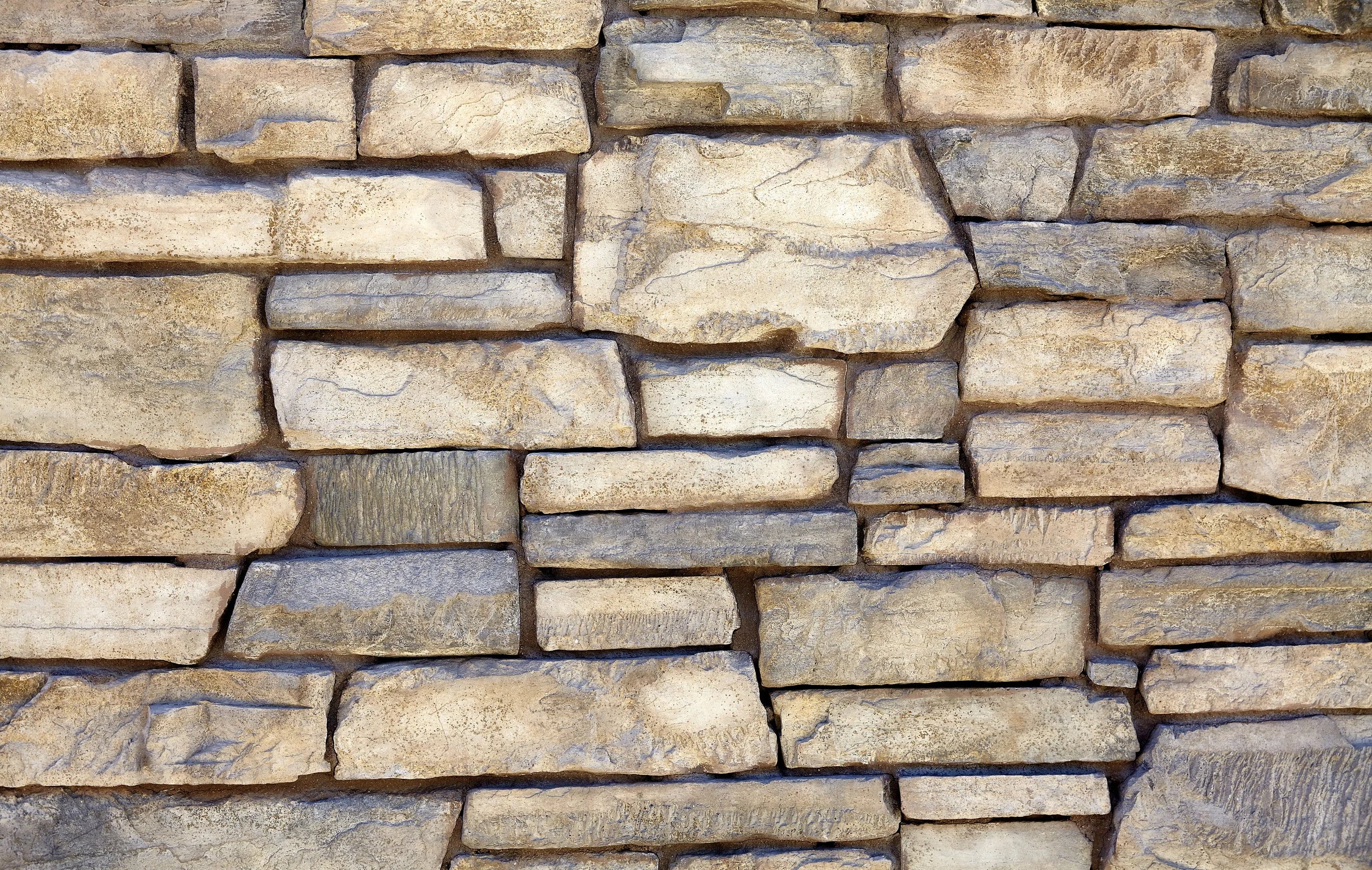 Manufactured stone veneer material